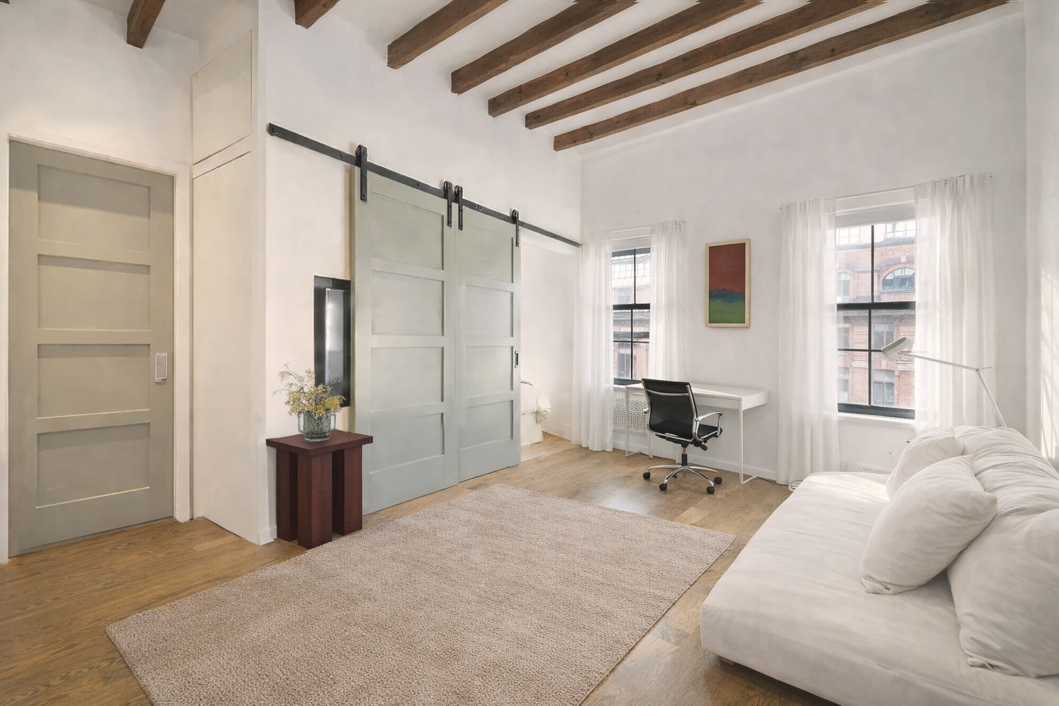 56 Jane Street, Unit 4B Manhattan, NY 10014 - Photo 1 of 5 a living room with furniture