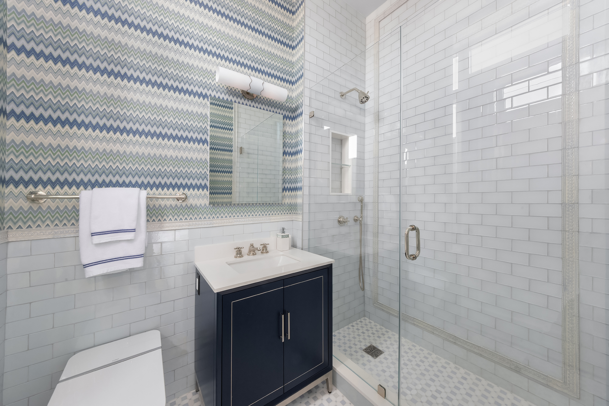 145 East 76th Street, Unit PH Manhattan, NY 10021 - Photo 15 of 19 a bathroom with a sink toilet and shower