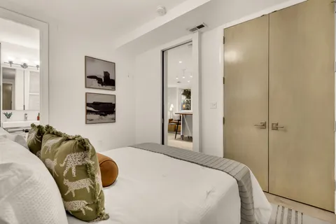 a view of a bathroom from the hallway