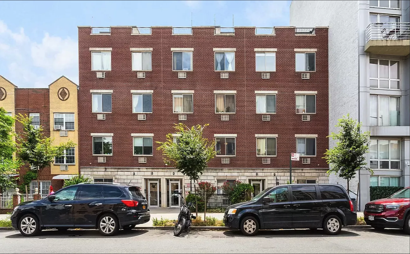 68 Maspeth Avenue, Unit 3A Brooklyn, NY 11211 - Photo 5 of 9 a view of a car parked in front of a building