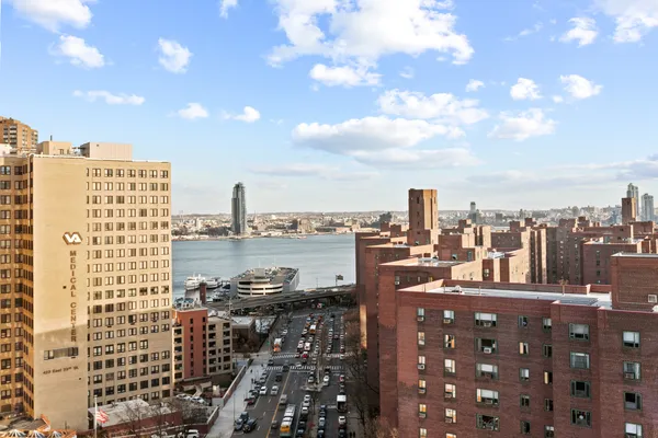 a view of a city with tall buildings