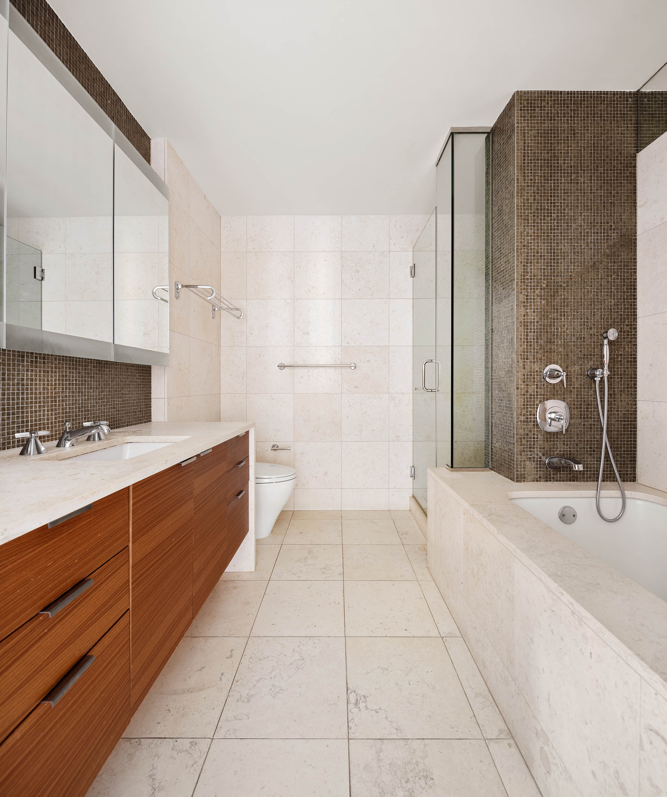 70 Little West Street, Unit 14B Manhattan, NY 10004 - Photo 5 of 17 a bathroom with a sink and a mirror