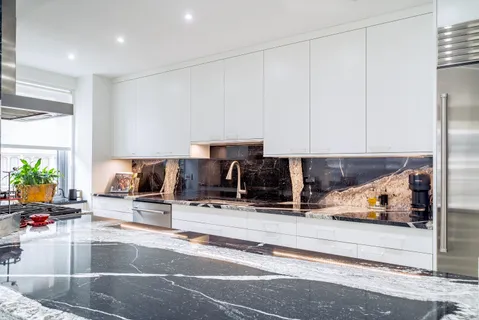 a view of living room with furniture and flat screen tv