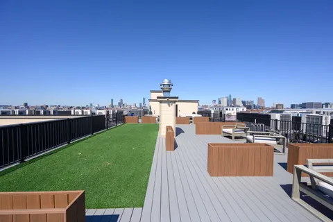 a view of a terrace with a garden