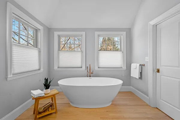 a workspace with furniture and a window