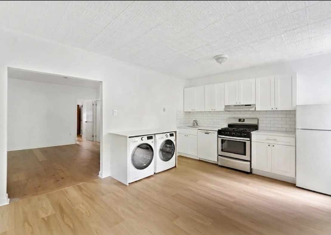 281 6th Street, Unit 1 Brooklyn, NY 11215 - Photo 4 of 7 a kitchen with a stove and a refrigerator