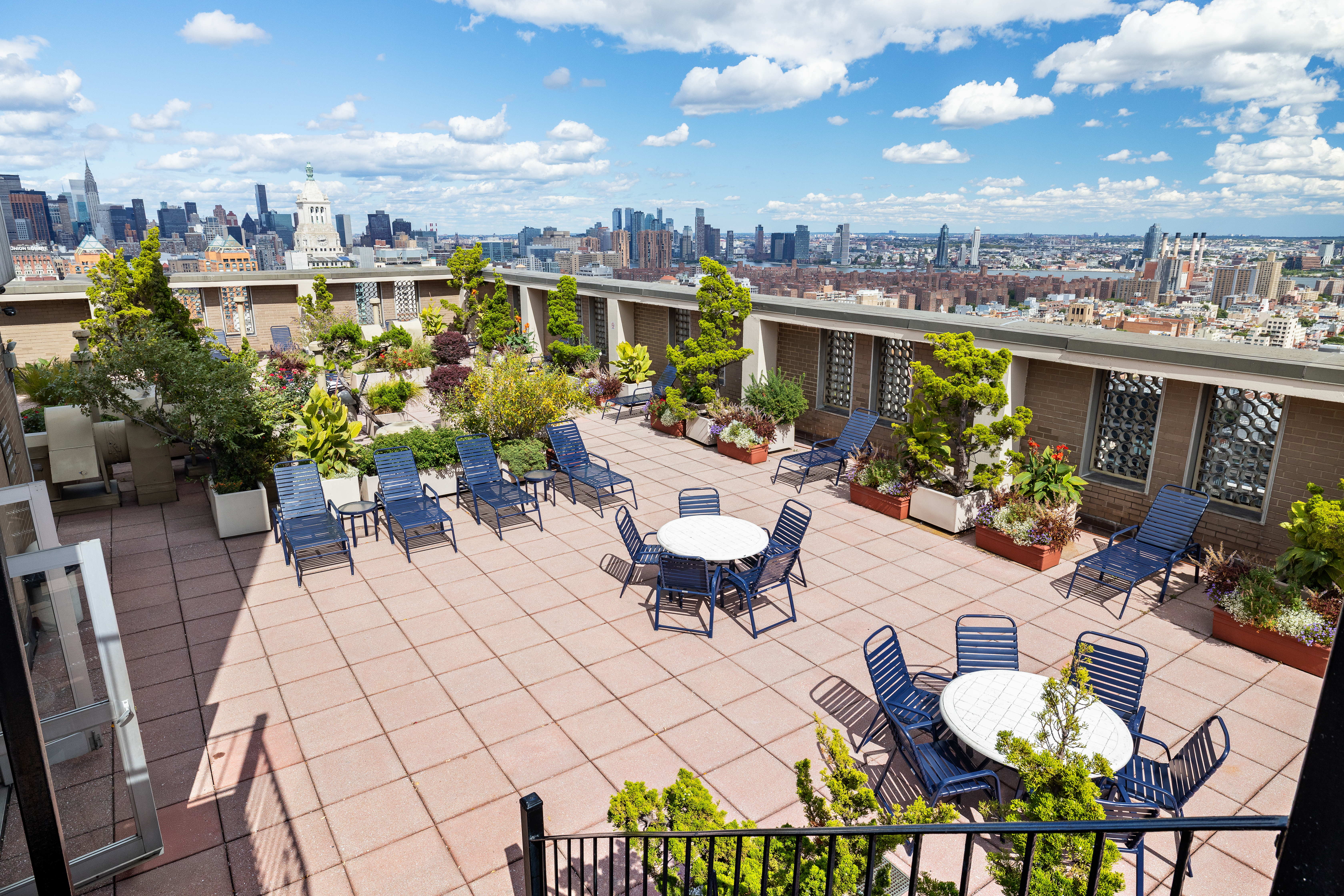 60 East 8th Street, Unit 20P Manhattan, NY 10003 - Photo 7 of 11 a view of a chairs and table in a patio