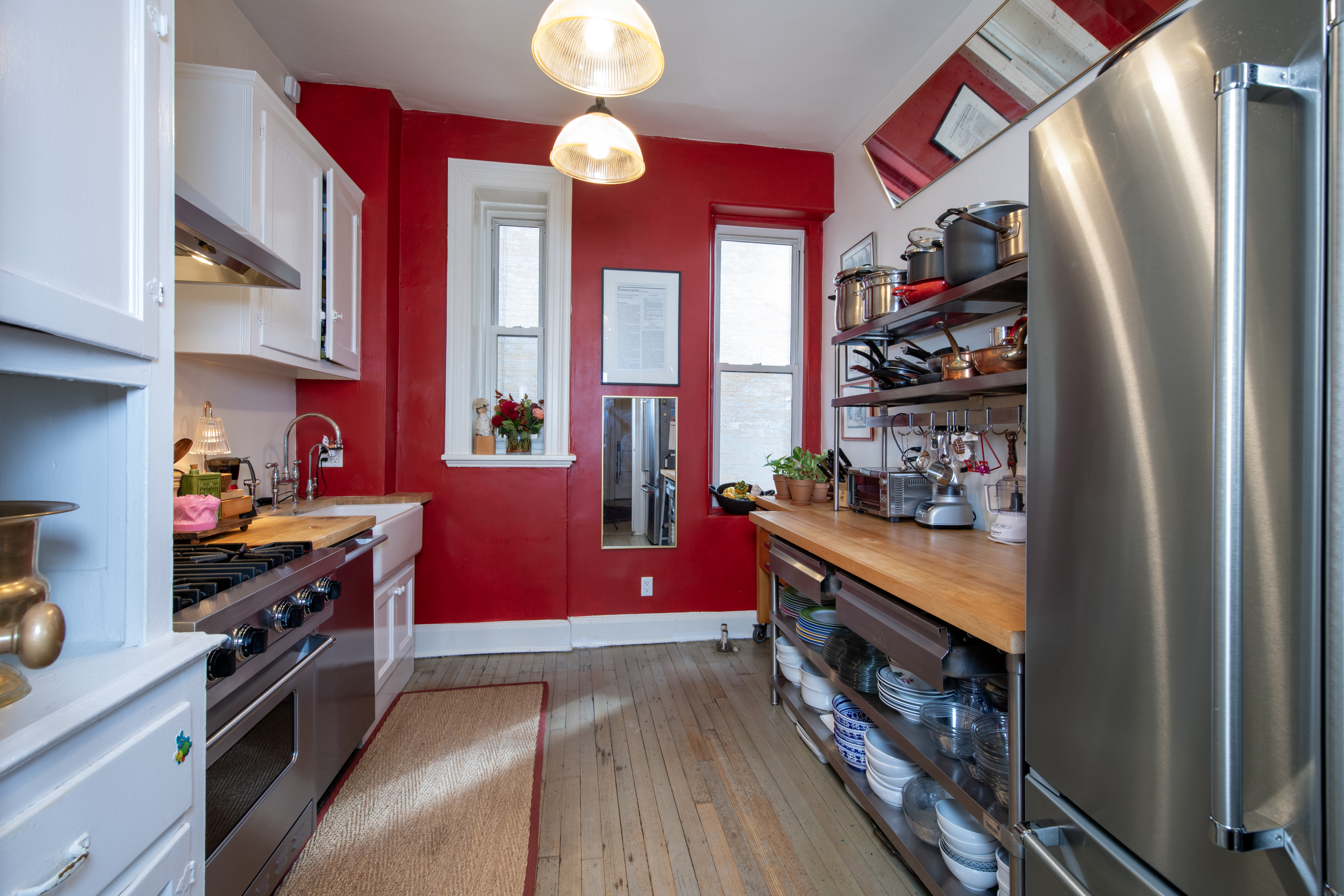 194 Riverside Drive, Unit 5C/6C Manhattan, NY 10025 - Photo 5 of 26 a kitchen with stainless steel appliances granite countertop a refrigerator and a stove top oven