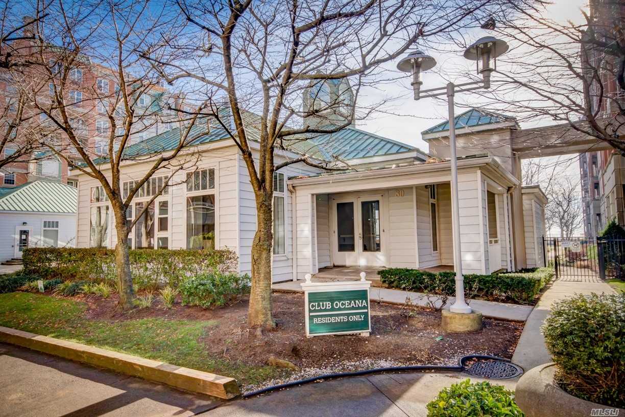 135 Oceana Drive East, Unit 2C Brooklyn, NY 11235 - Photo 19 of 29 a front view of a house with garden