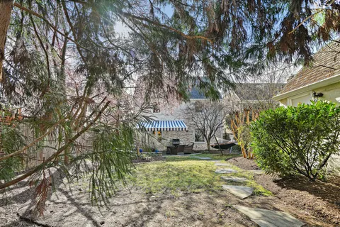 a house view with a garden space