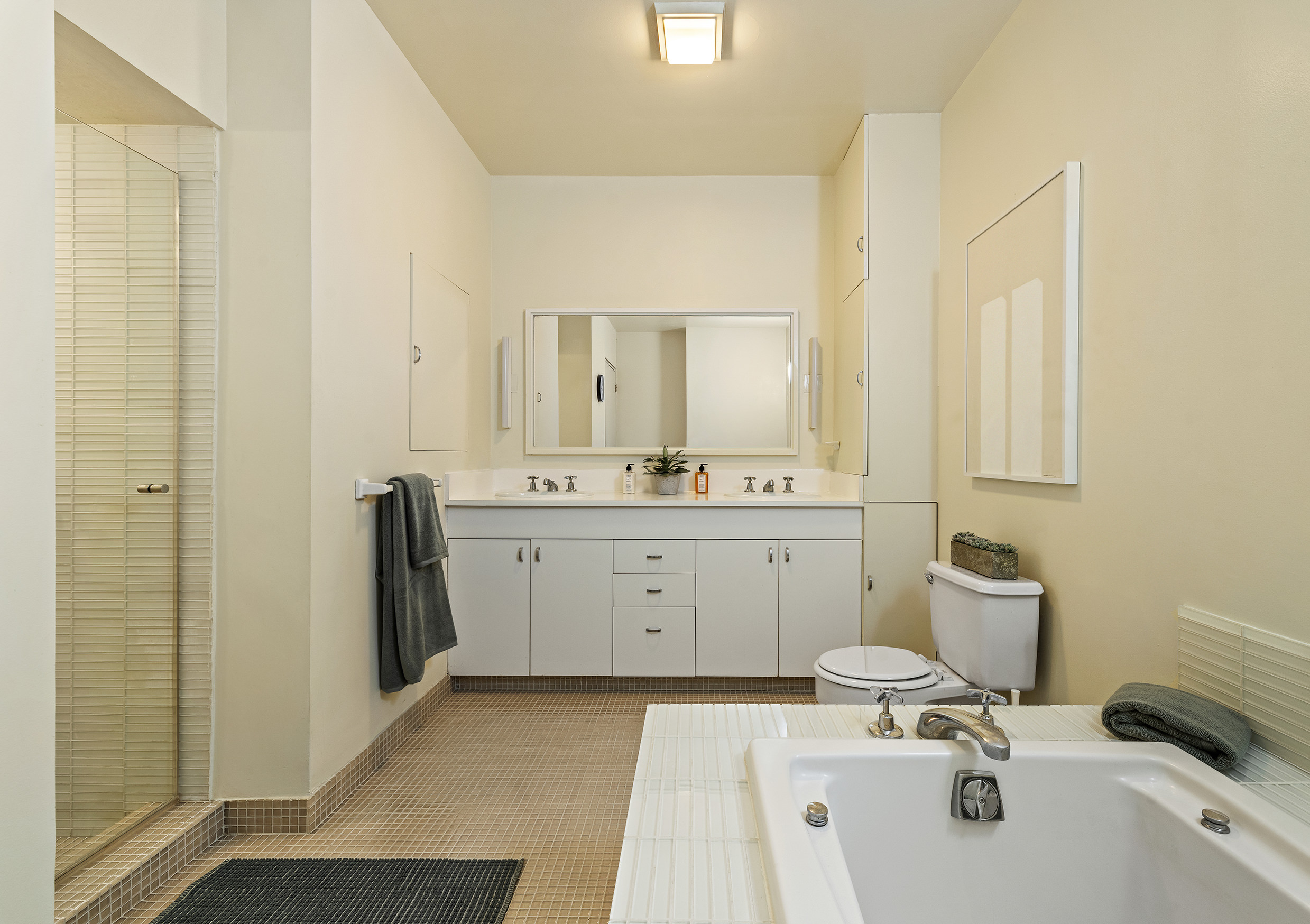 20 Jay Street, Unit 2/3C Manhattan, NY 10013 - Photo 11 of 16 a bathroom with a sink toilet and shower