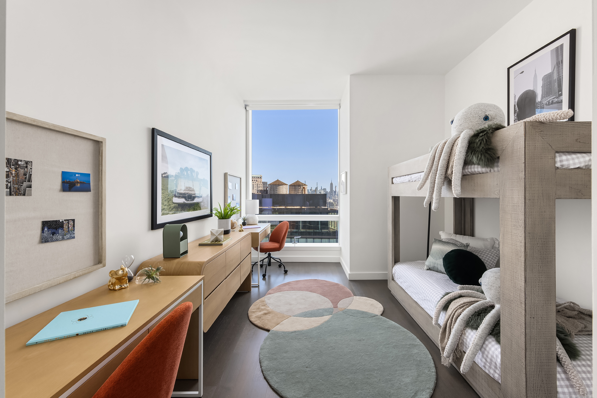 111 Murray Street, Unit 38A Manhattan, NY 10007 - Photo 12 of 29 a living room with furniture and a flat screen tv
