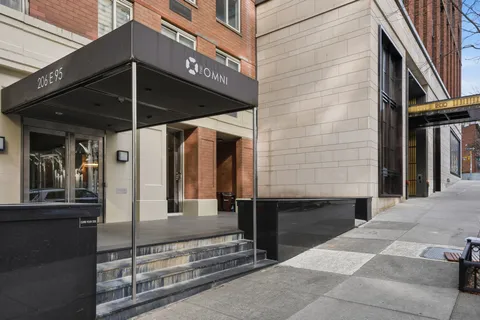 a view of a wooden door of the house