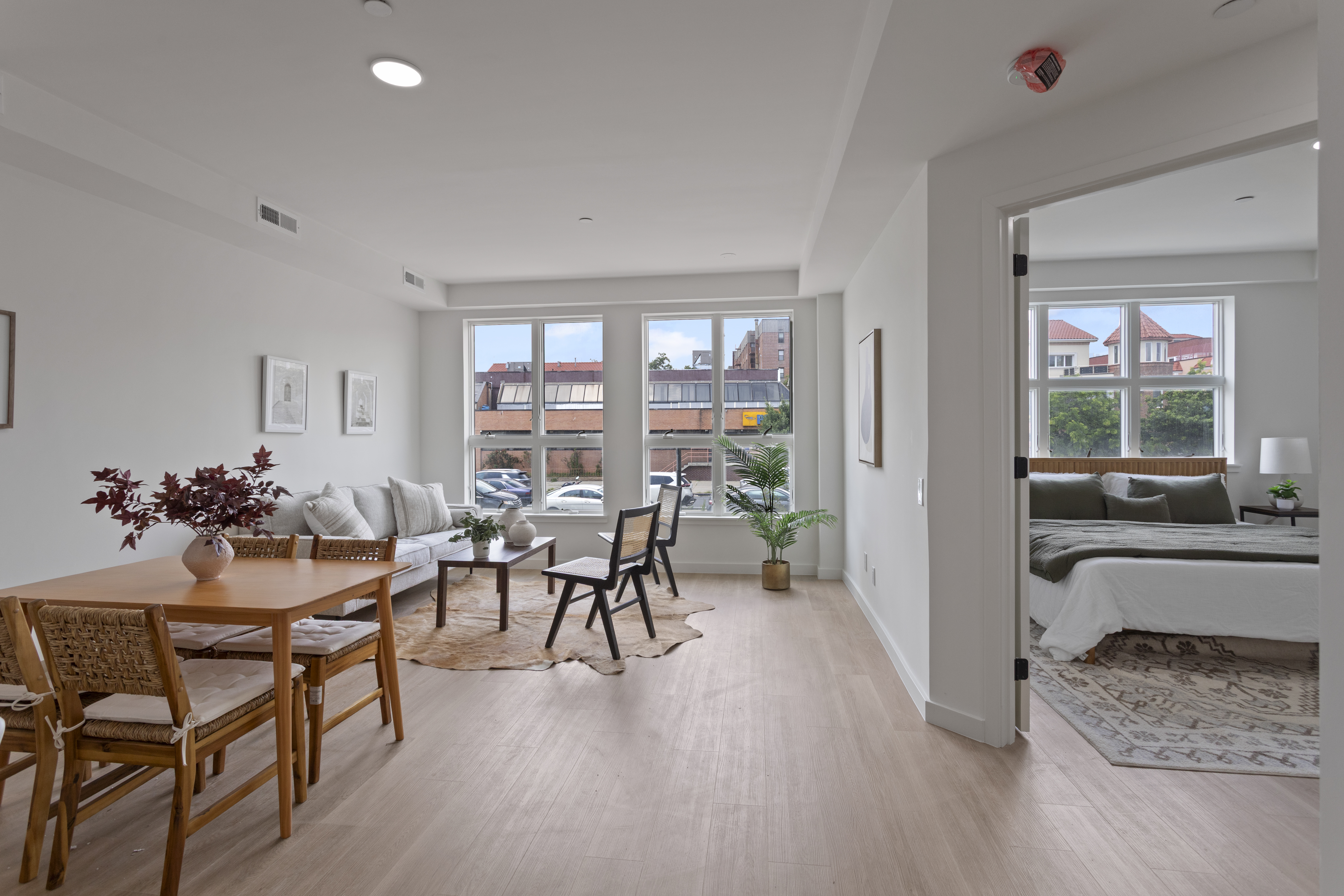 3112 Emmons Avenue, Unit 104 Brooklyn, NY 11235 - Photo 2 of 12 a view of a dining room with furniture window and outside view