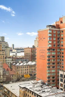 a view of a city that has tall building