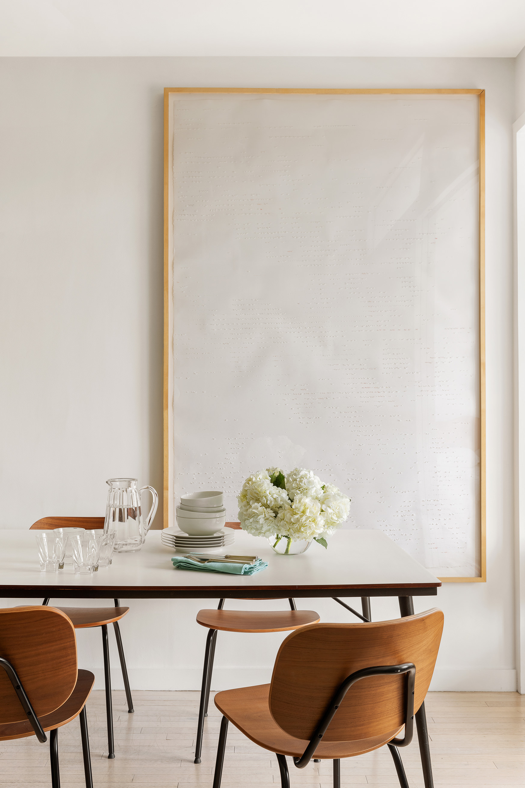 121 West 19th Street, Unit 10C Manhattan, NY 10011 - Photo 8 of 14 a view of a dining room with furniture and wooden floor