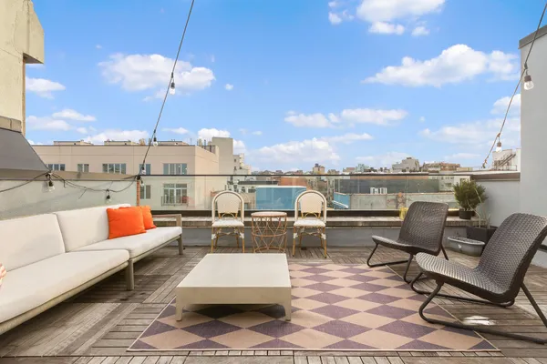 a view of a terrace with couches