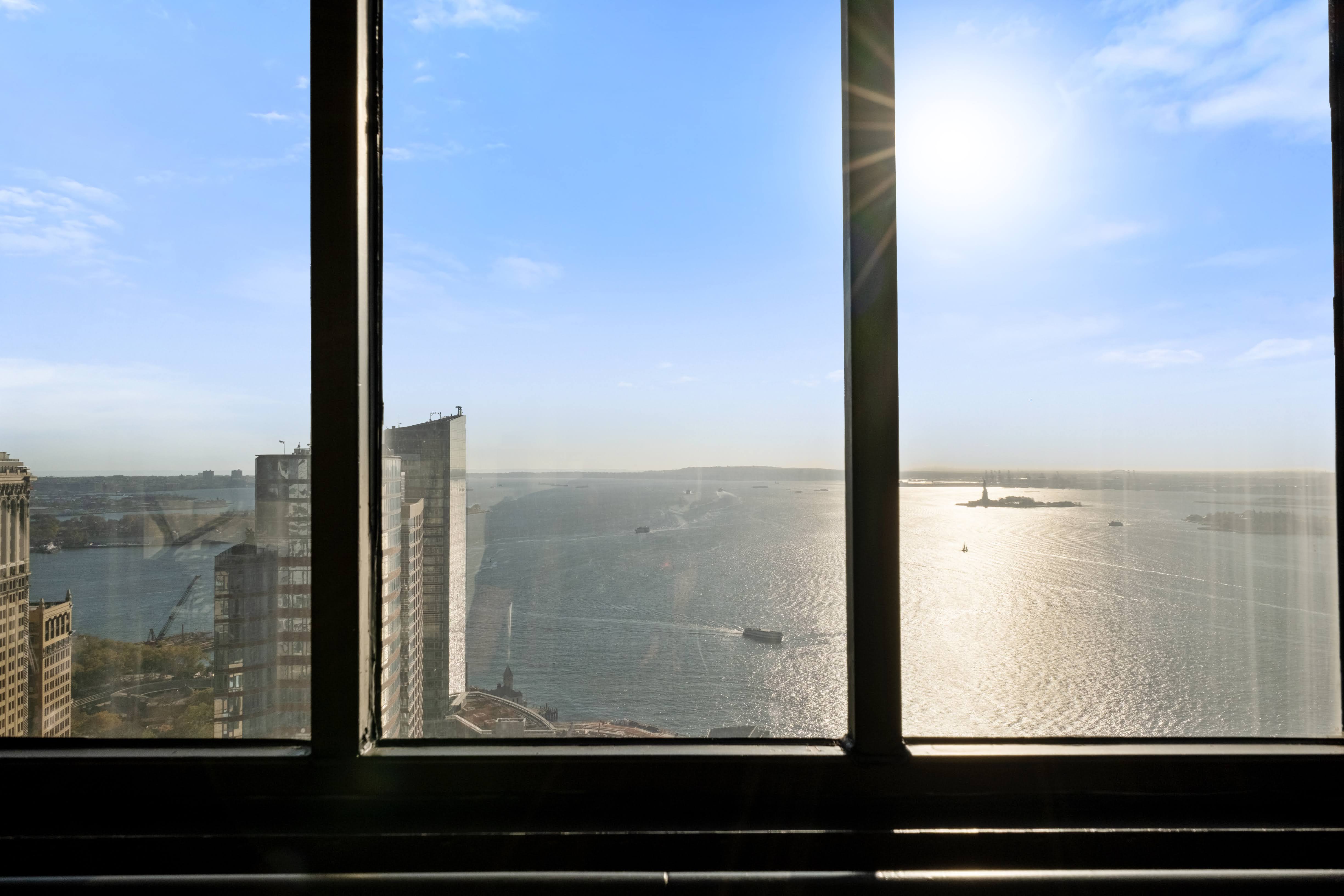 200 Rector Place, Unit 16F Manhattan, NY 10280 - Photo 17 of 25 a view of sky from window