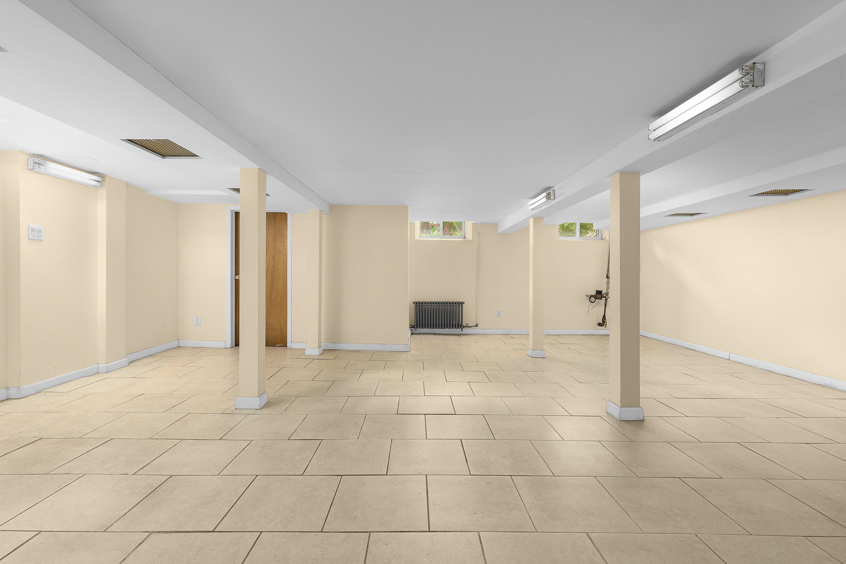 39 Broome Street Brooklyn, NY 11222 - Photo 13 of 16 a view of a livingroom with a ceiling fan