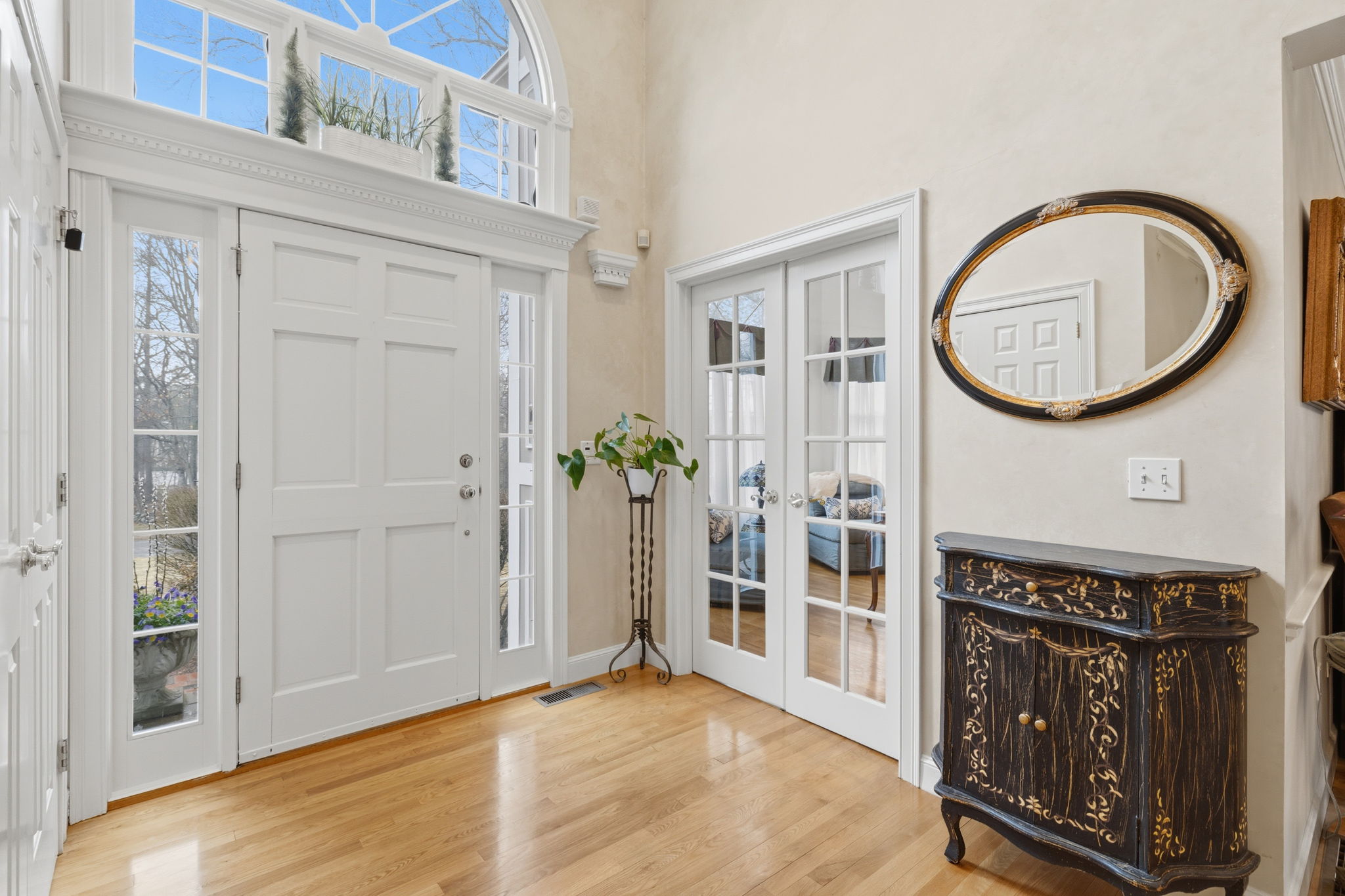 20 Marshall Path Acton, MA 01720 - Photo 10 of 19 a view of a livingroom with wooden floor and entryway