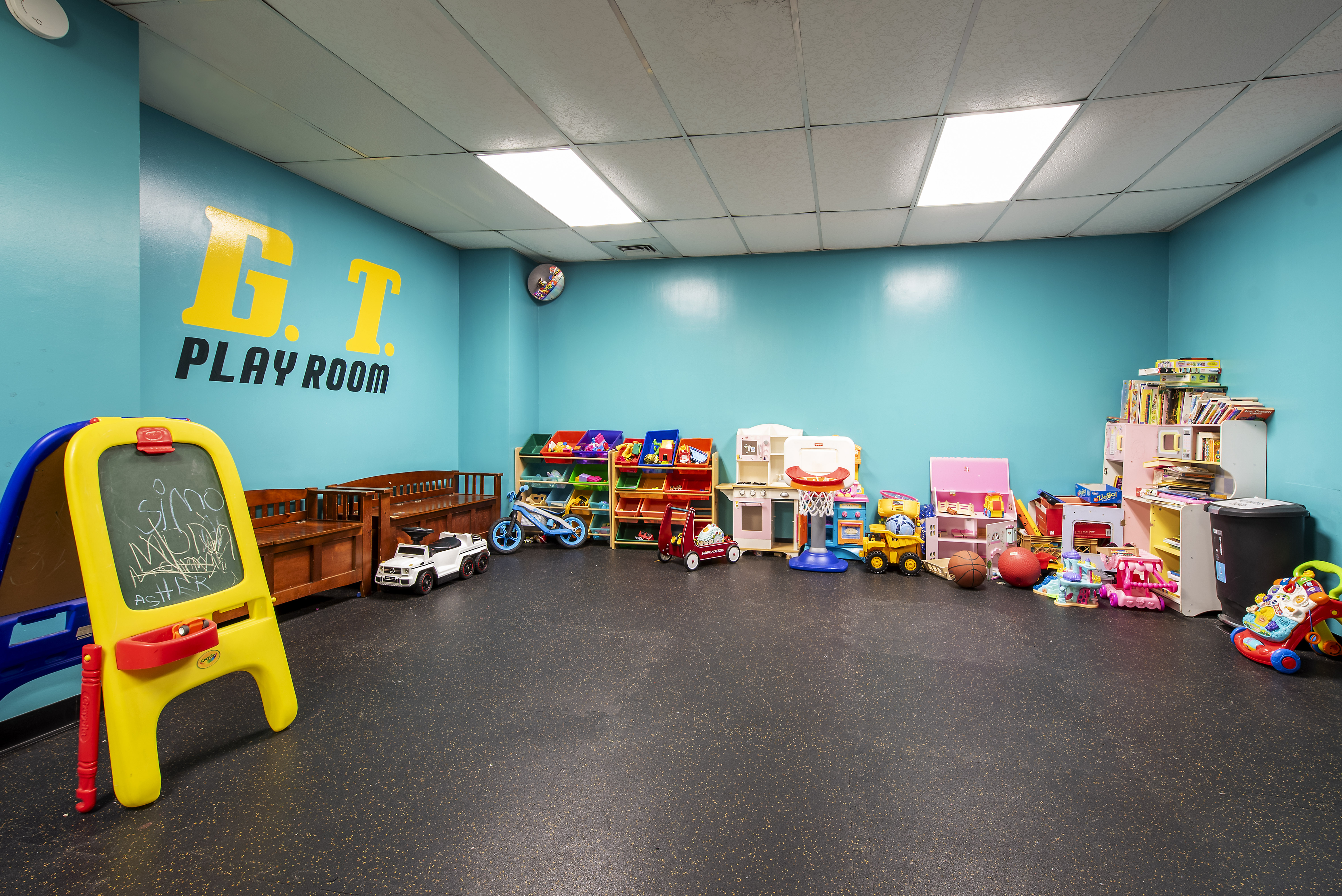 70-25 Yellowstone Boulevard, Unit 8N Queens, NY 11375 - Photo 16 of 19 a play room with toys