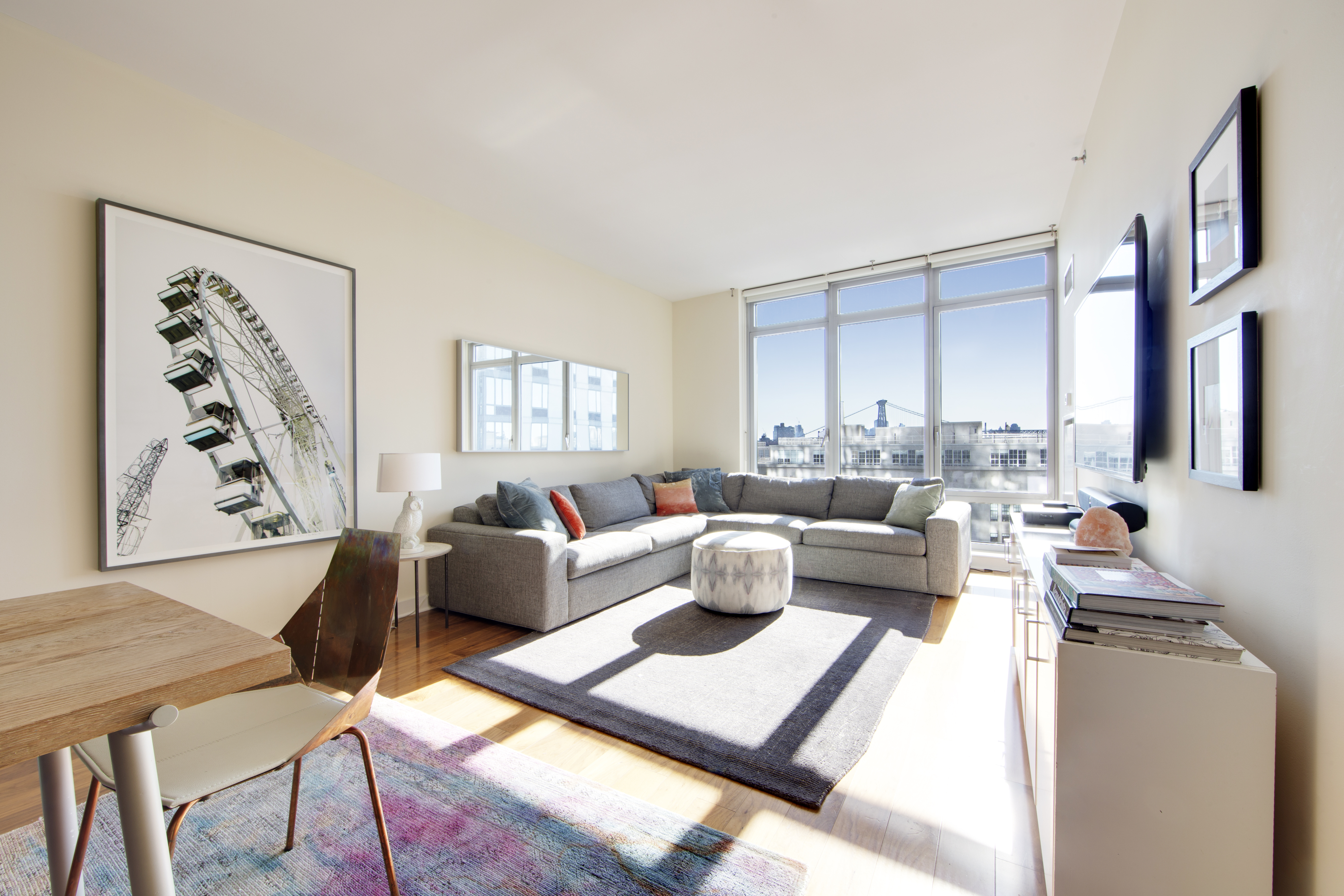 2 Northside Piers, Unit 10B Brooklyn, NY 11249 - Photo 3 of 14 a living room with furniture and a window