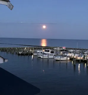 a view of living room and dining room