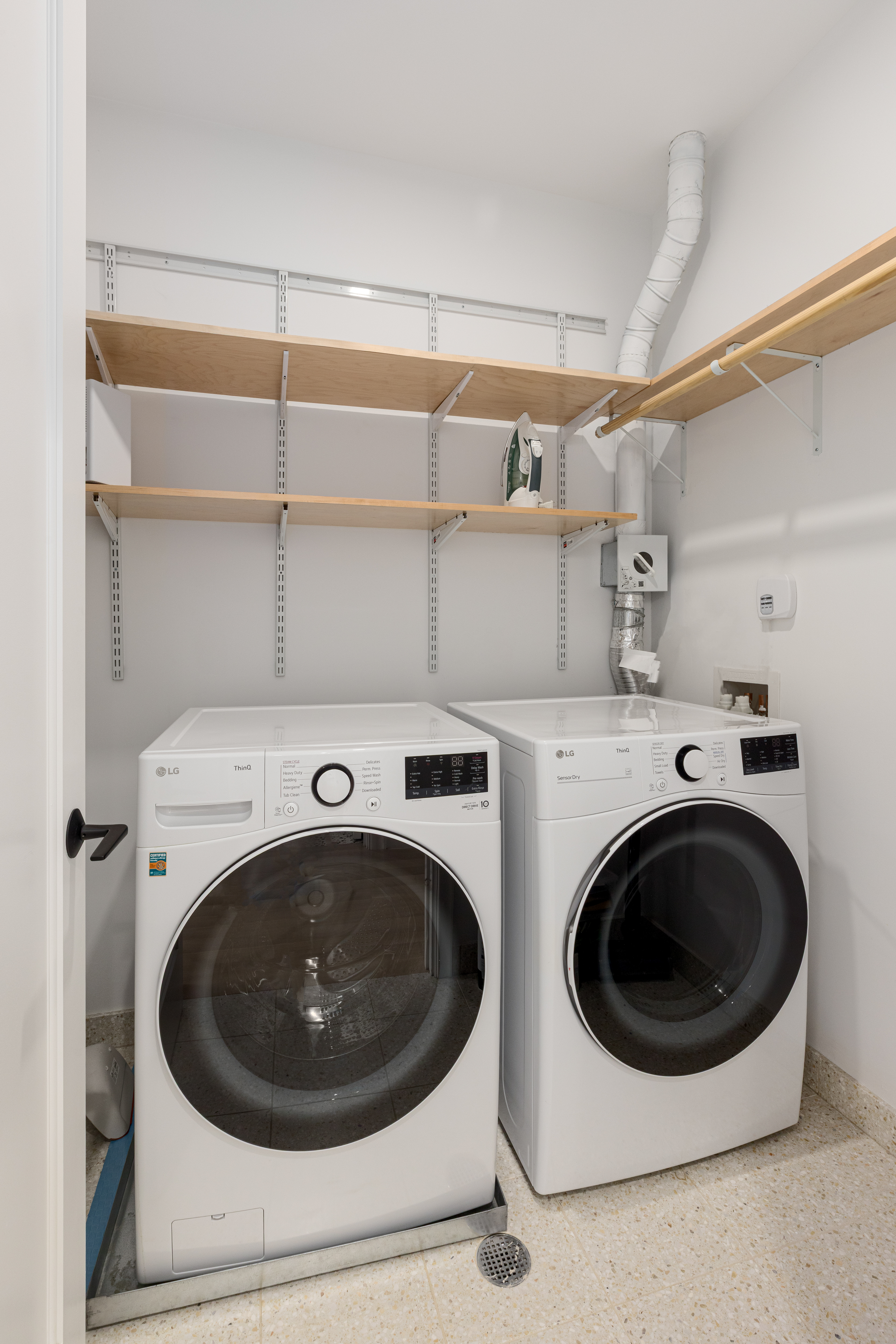 179 Devoe Street Brooklyn, NY 11211 - Photo 18 of 20 a utility room with dryer and washer