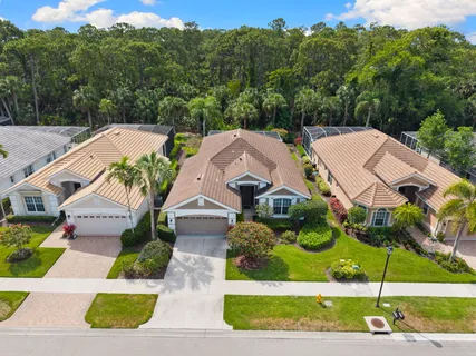$995,000 | 1717 Winding Oaks Way, Naples, FL 34109