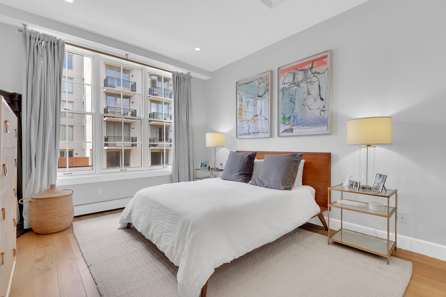 84 Lefferts Place, Unit 3B Brooklyn, NY 11238 - Photo 7 of 12 a bedroom with a bed painting on wall and a large window