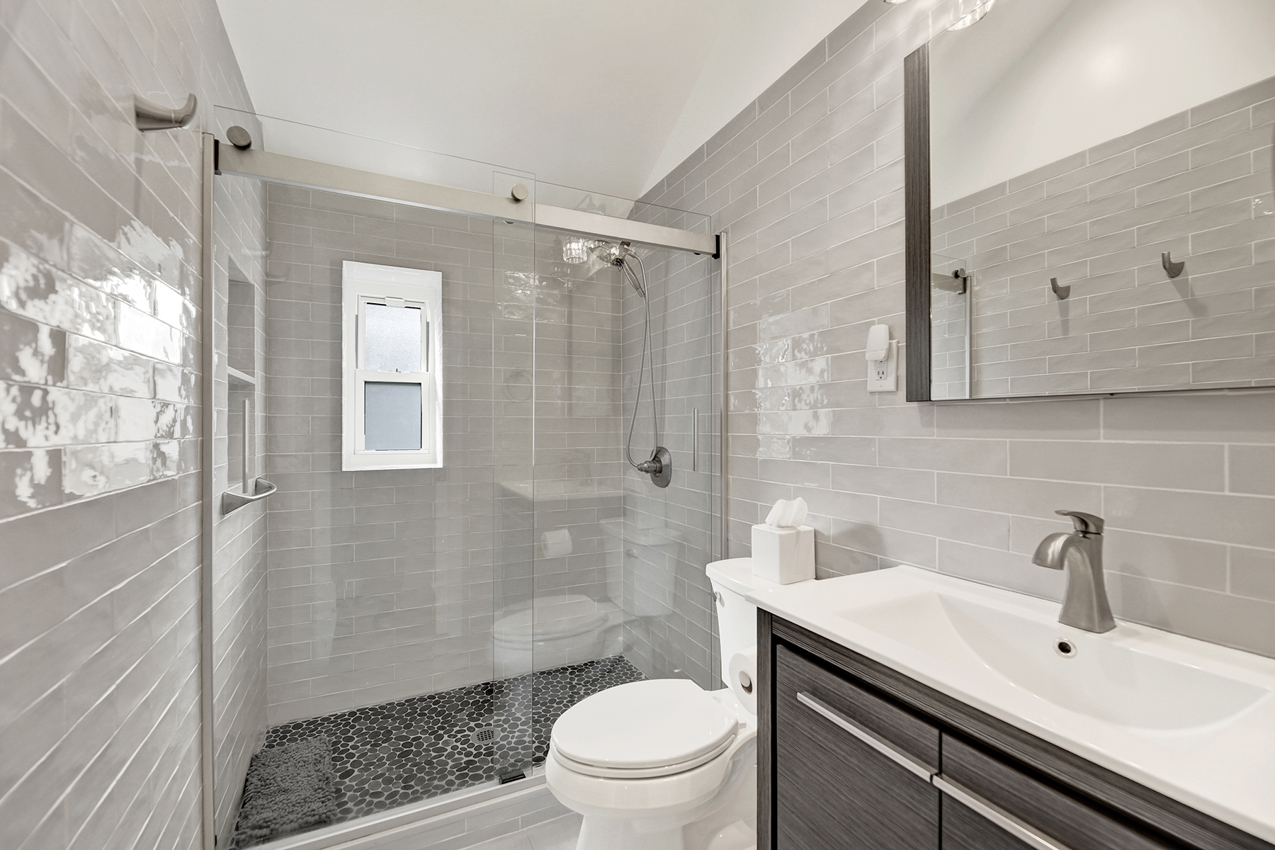 4-53 Beach 142nd Street Queens, NY 11694 - Photo 19 of 39 a bathroom with a sink a toilet and shower