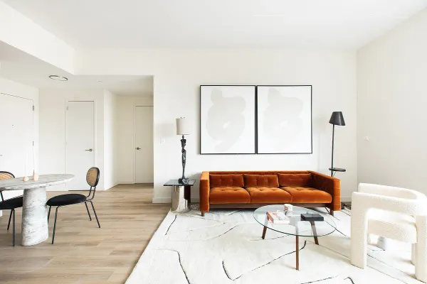 a living room with furniture and a window
