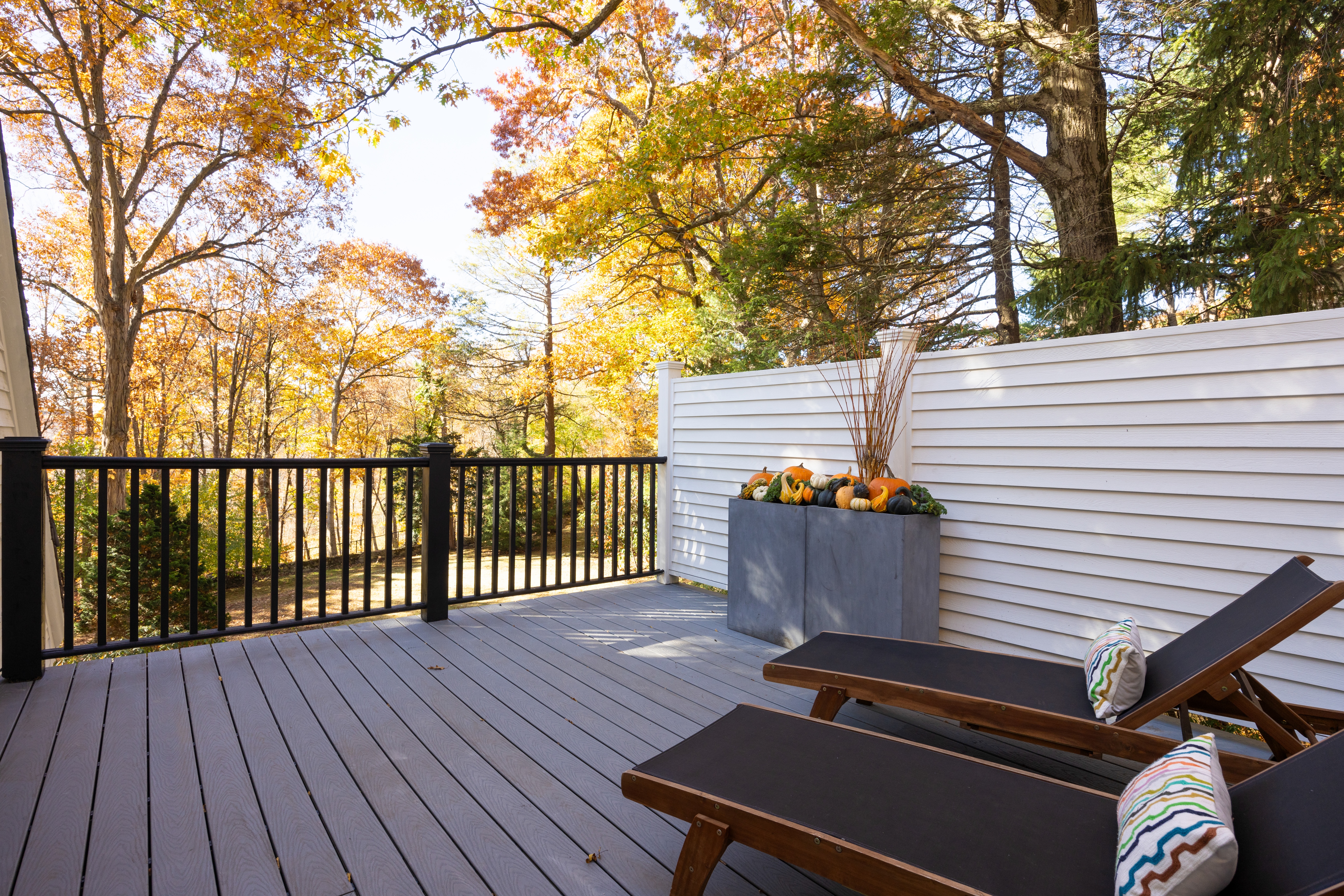 111 Beverly Road Brookline, MA 02467 - Photo 18 of 27 a view of a roof deck with wooden floor and fence