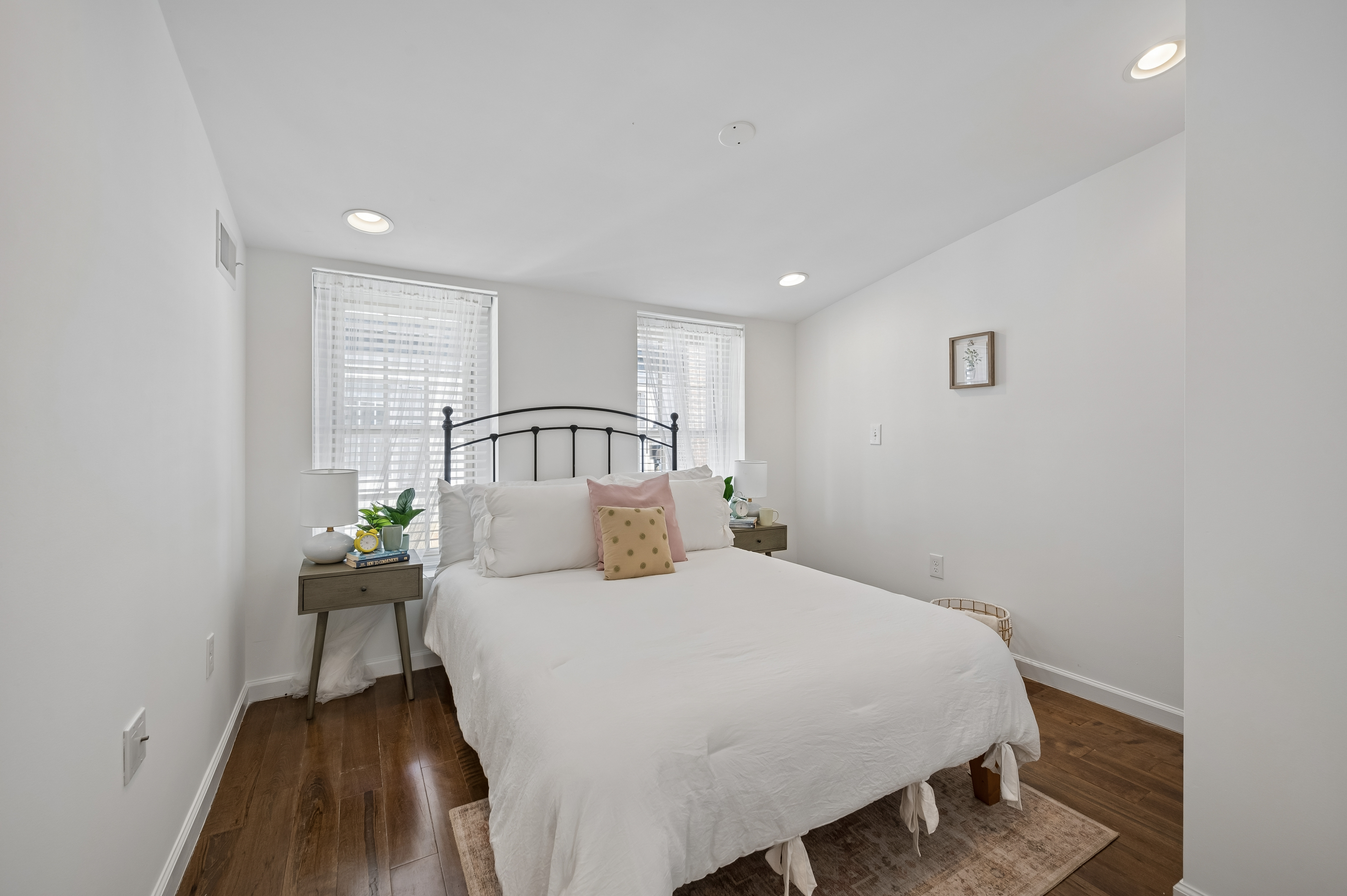 2420 Manning Street Philadelphia, PA 19103 - Photo 9 of 25 a bedroom with a bed and a table