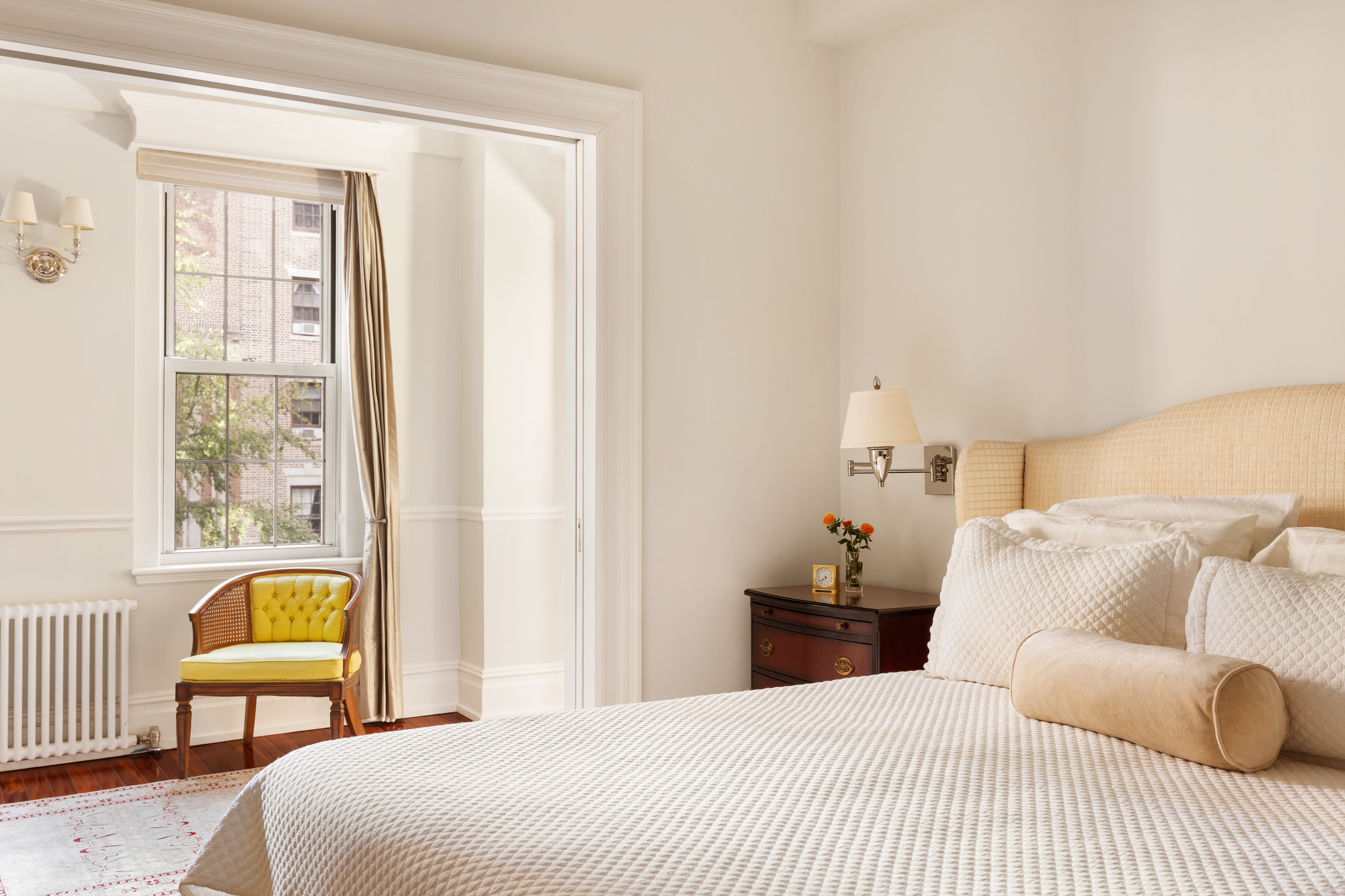 30 5th Avenue, Unit 3H Manhattan, NY 10011 - Photo 4 of 11 a bedroom with a bed and a window