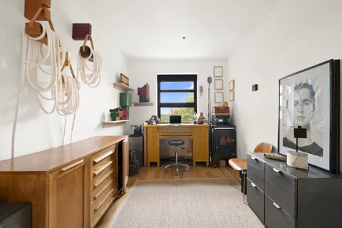 a room with cabinets a washer and dryer