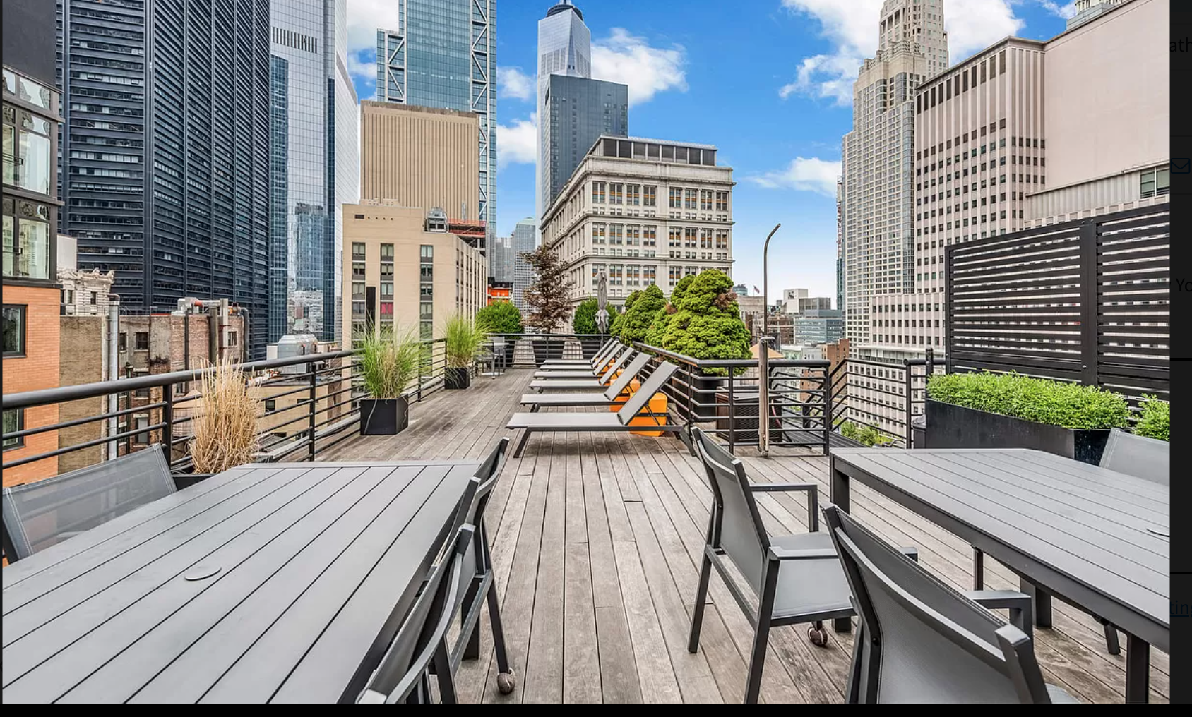 71 Nassau Street, Unit 12C Manhattan, NY 10038 - Photo 15 of 18 a view of a balcony with chairs