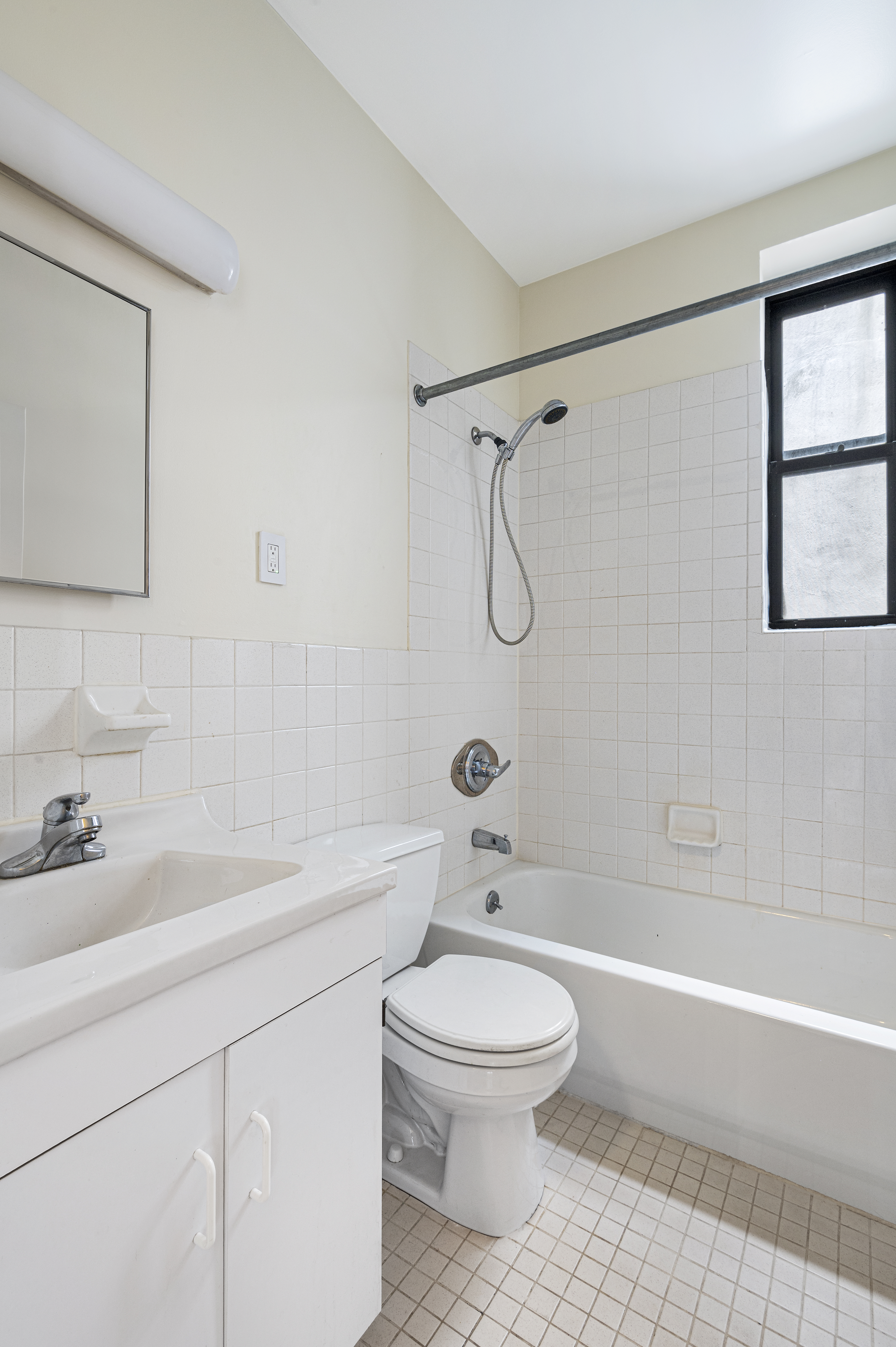 11 St Nicholas Avenue, Unit 5A/5H Manhattan, NY 10026 - Photo 5 of 6 a bathroom with a sink a toilet and a bathtub