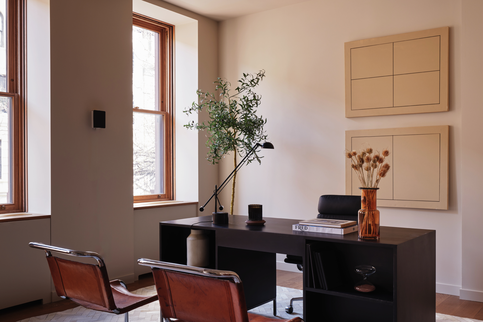 48-50 West 69th Street Manhattan, NY 10023 - Photo 10 of 33 a view of a workspace with furniture and a window