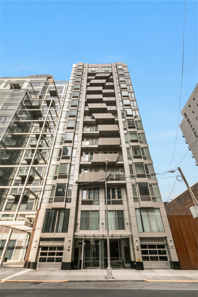 44-15 Purves Street, Unit PHB Queens, NY 11101 - Photo 7 of 8 a front view of a building