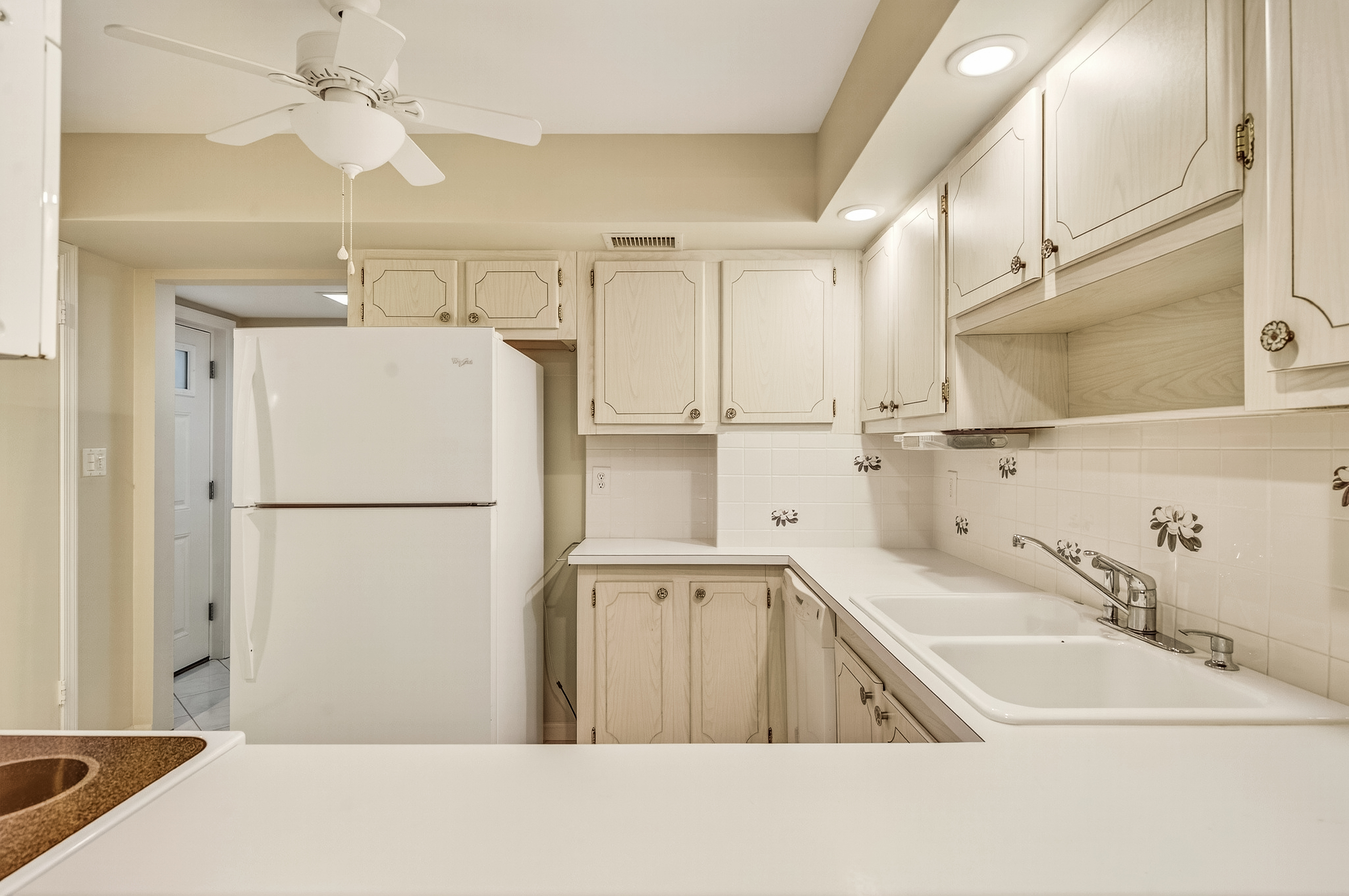 4601 Highway A1a, Unit 102 Vero Beach, FL 32963 - Photo 7 of 29 a view of a kitchen with a sink