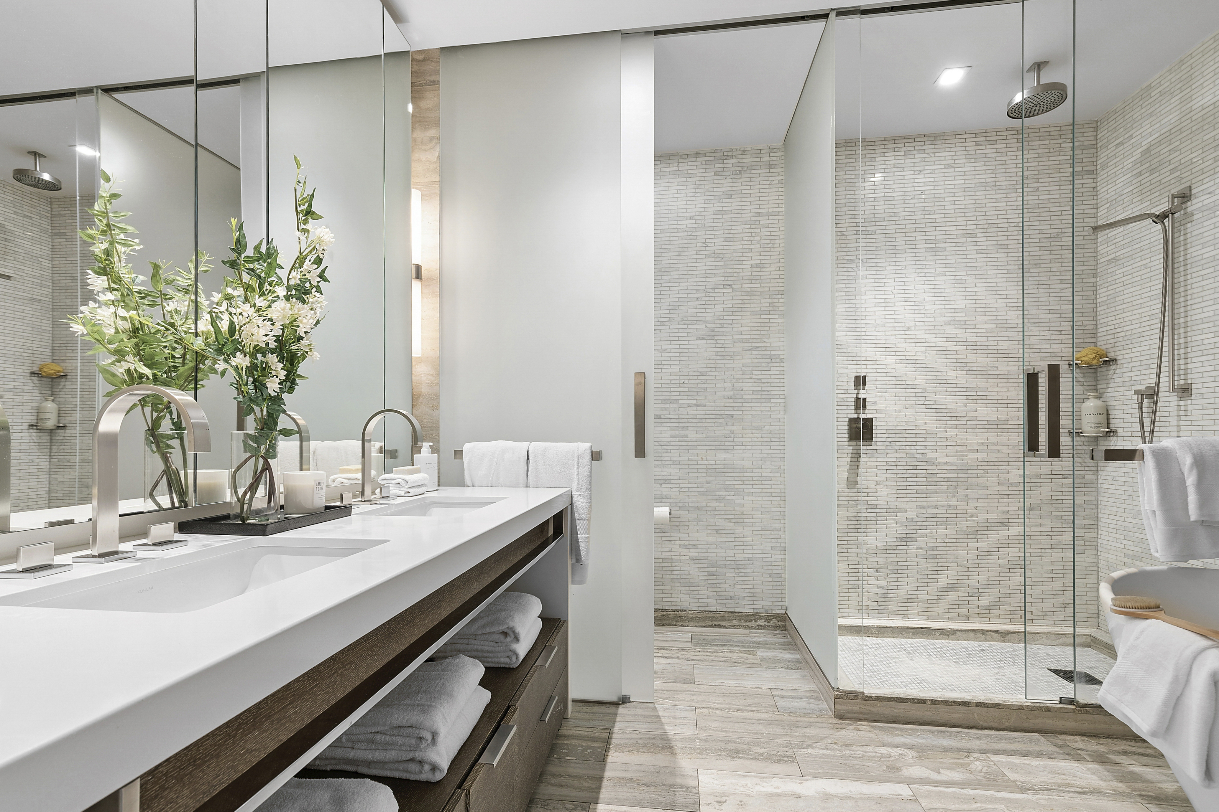 400 West 12th Street, Unit 3E Manhattan, NY 10014 - Photo 7 of 11 a bathroom with a shower and a sink