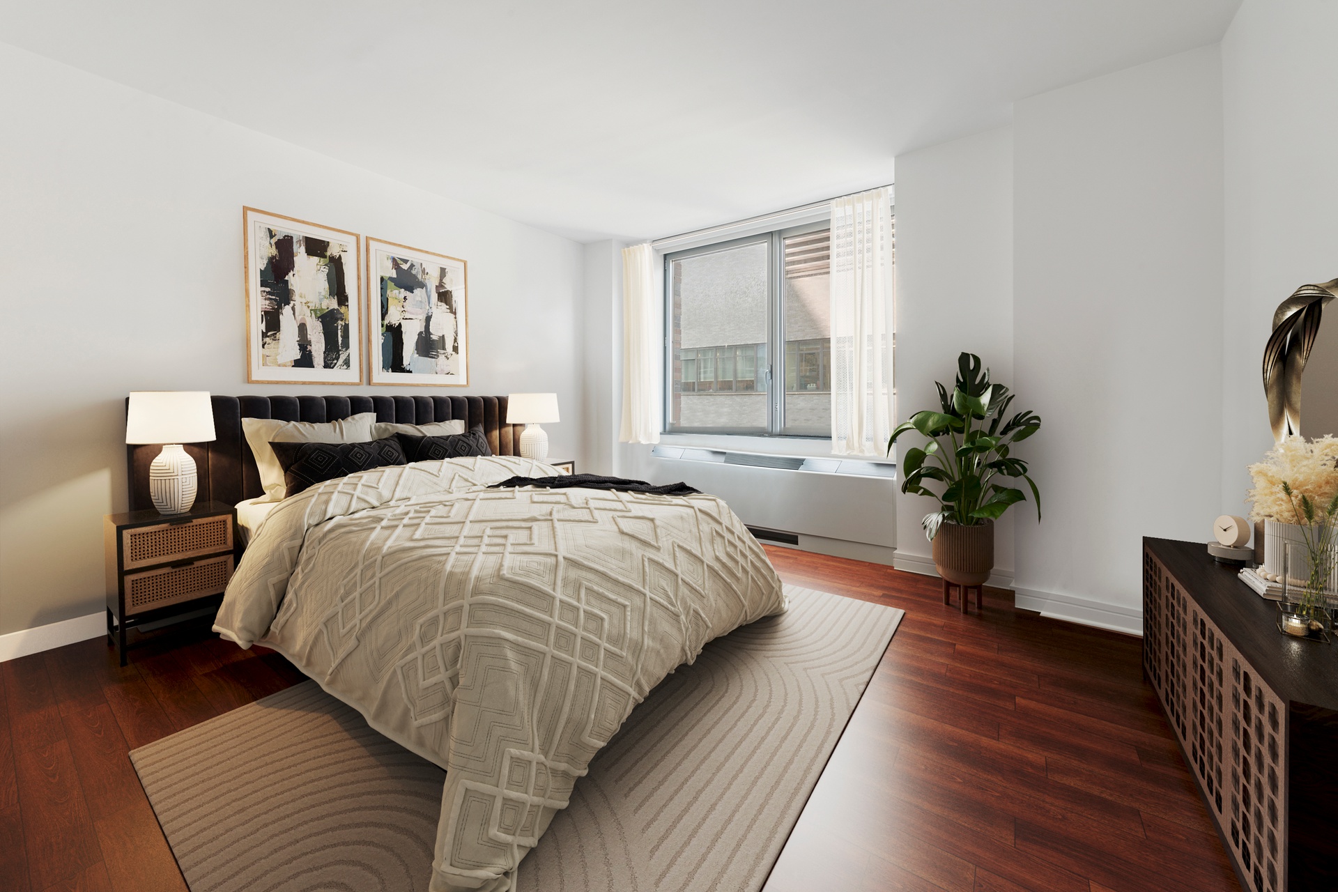 30 West Street, Unit 10A Manhattan, NY 10004 - Photo 4 of 16 a bedroom with a large bed and a potted plant