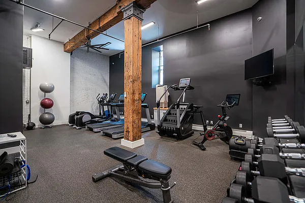 275 Park Avenue, Unit 2HH Brooklyn, NY 11205 - Photo 7 of 11 a view of a room with gym equipment