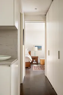 a view of a bedroom with a bed and couch