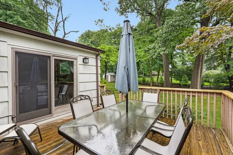 a view of balcony with a patio and wooden floor