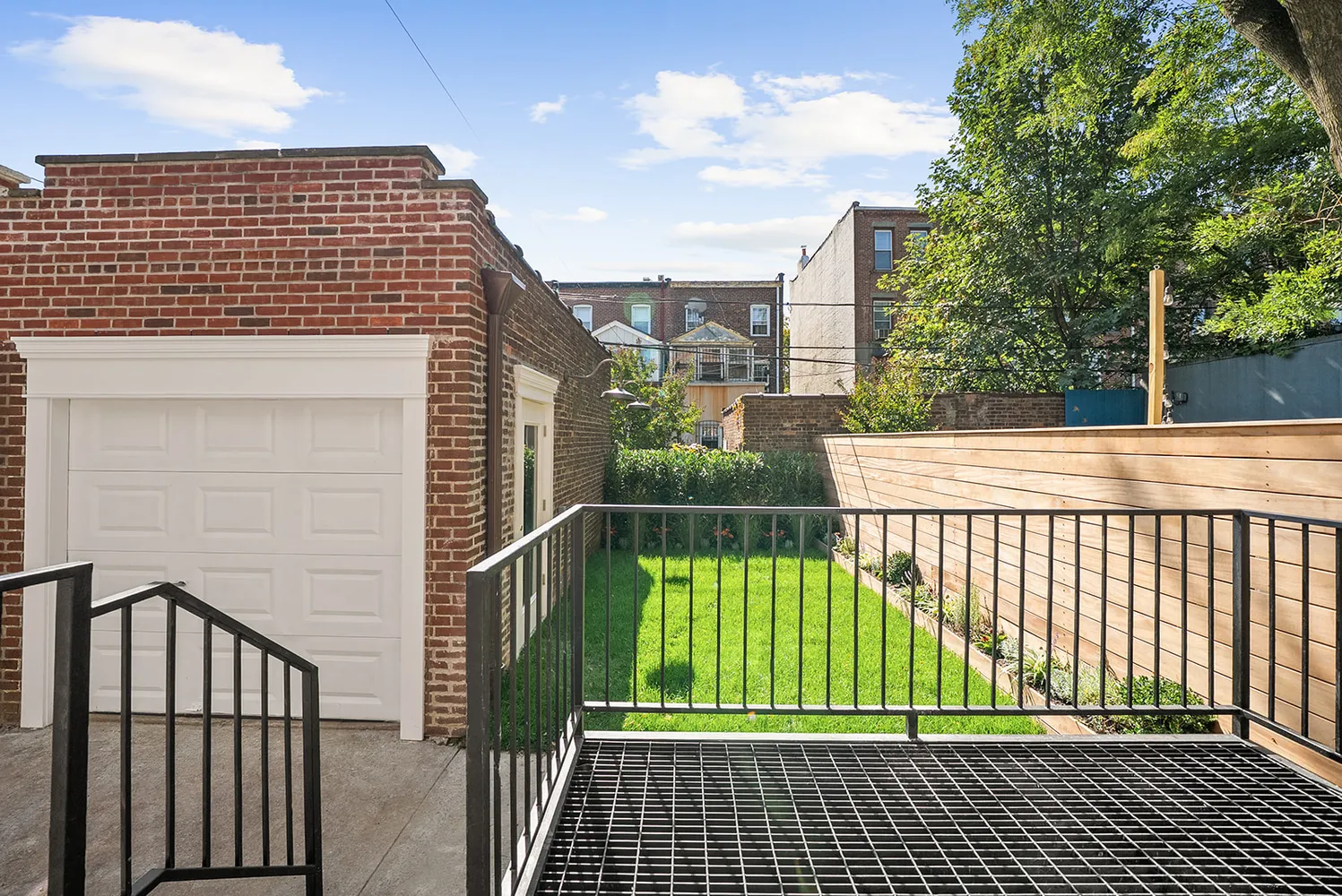 a view of entrance gate of a house