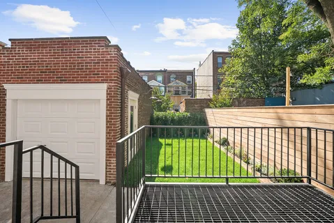 a view of entrance gate of a house