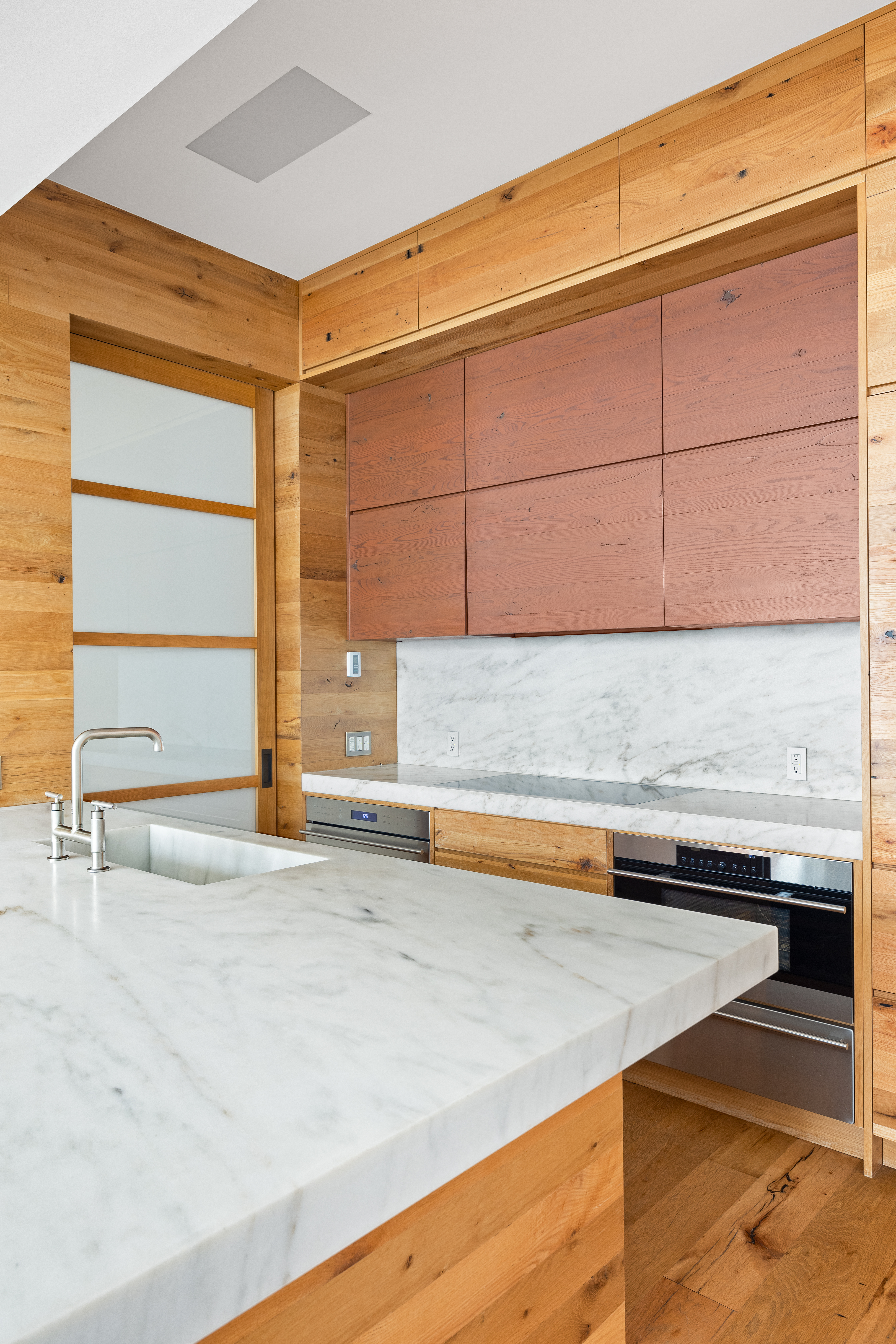 60 White Street, Unit 4E Manhattan, NY 10013 - Photo 9 of 19 a view of a kitchen with kitchen island and a sink