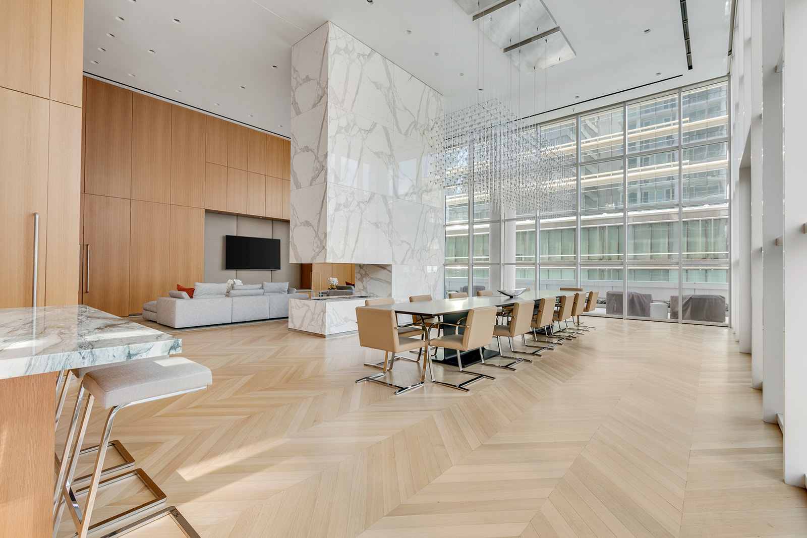 200 East 59th Street, Unit 11C Manhattan, NY 10022 - Photo 9 of 11 a living room with furniture and a flat screen tv